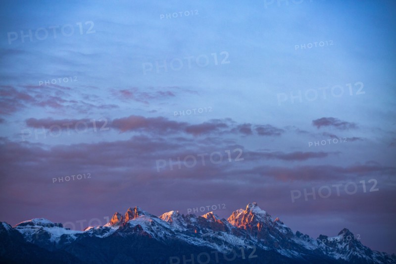 Sunset light on peaks of Teton Range in Grand Teton National Park