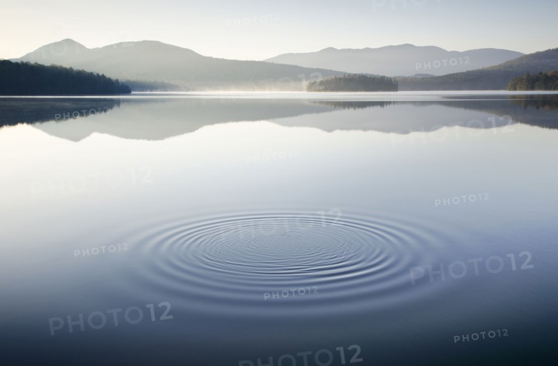 Ripples on calm lake surface