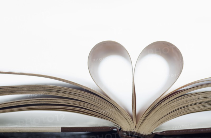 Book with pages folded in heart shape