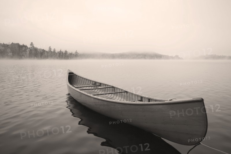 Empty canoe on Upper Saranac Lake