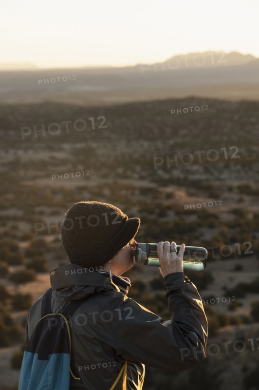 Female hiker taking break in Galisteo Basin Preserve