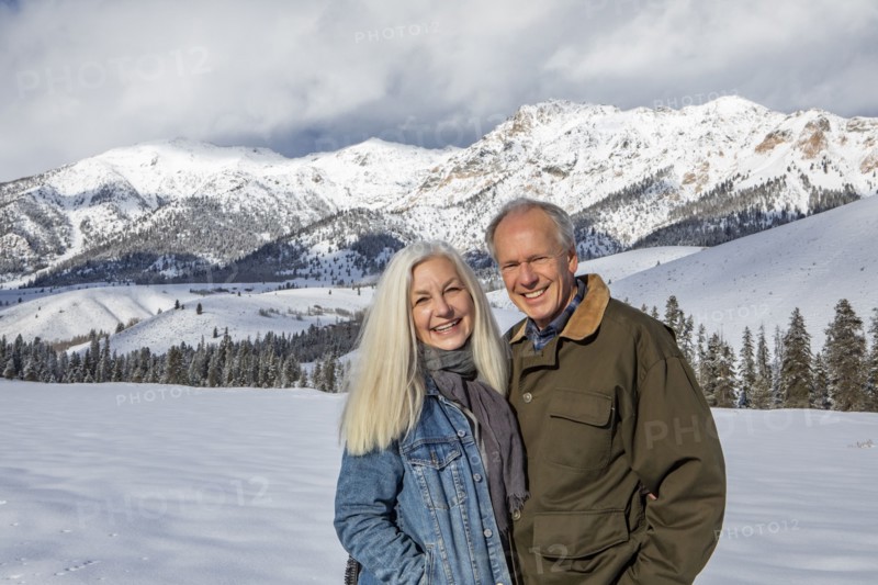 Winter portrait of senior couple in front of Boulder Mountains