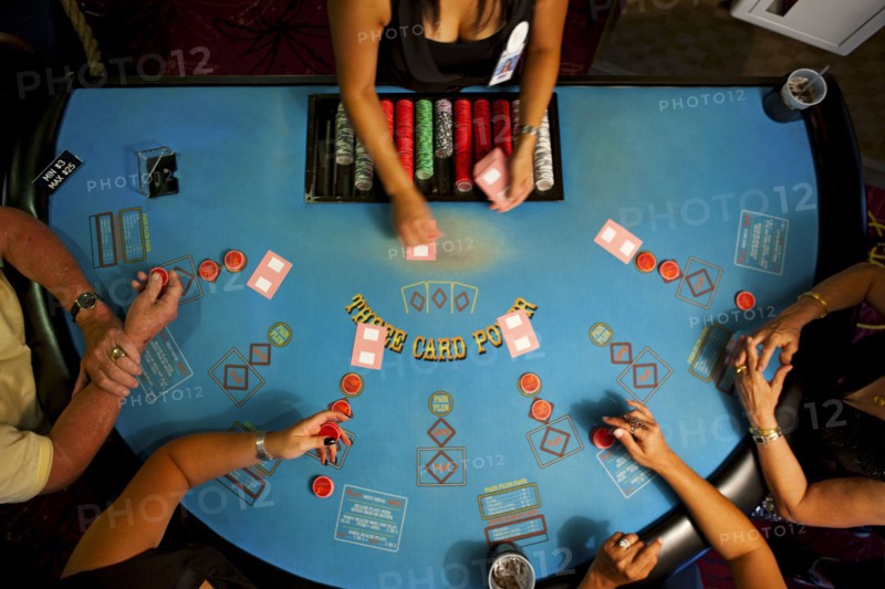 People playing poker in casino