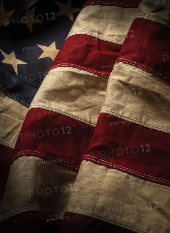 Close-up of old American flag