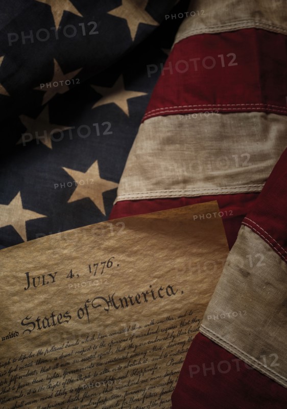Close-up of Declaration of Independence resting on American flag