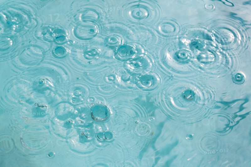 Concentric ripples on water surface