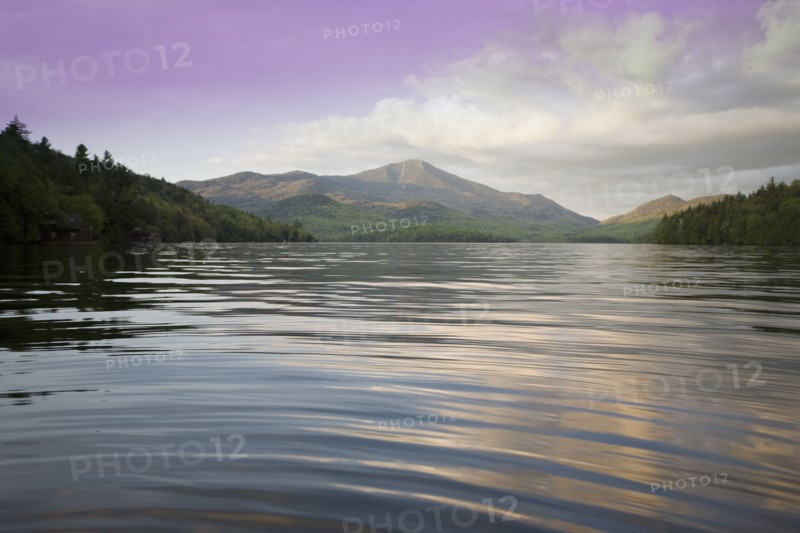 Calm Lake Placid and Whiteface Mountain at sunset