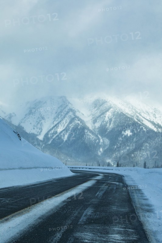 Road through snowy mountains