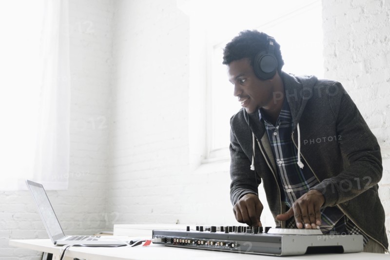 DJ using mixing desk