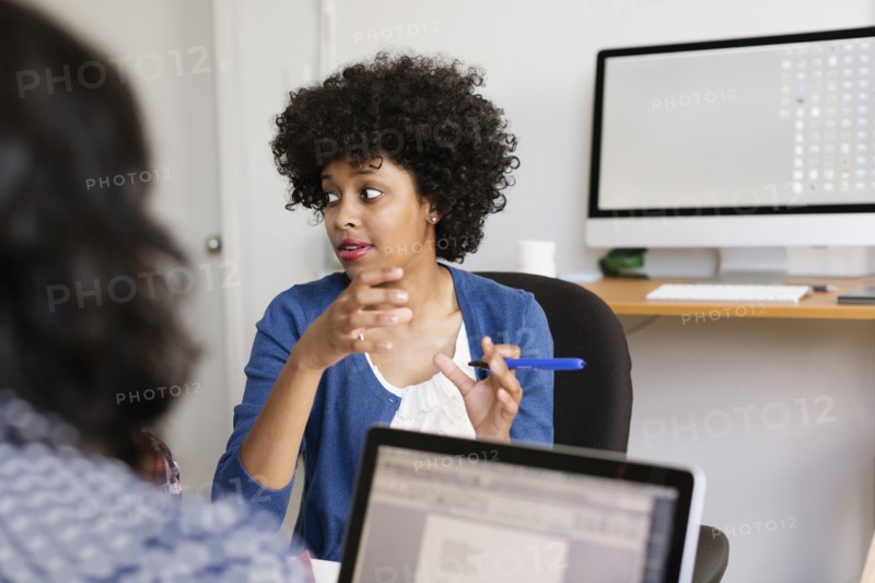 Woman in discussion in Small Business