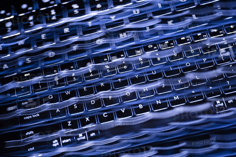 Close-up od blurred black computer keyboard