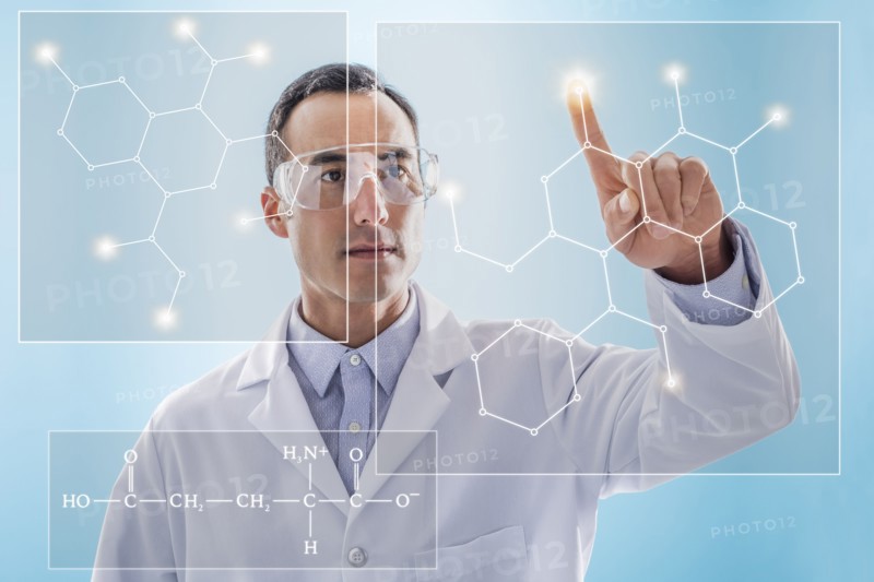 Scientist using virtual screen for chemical research