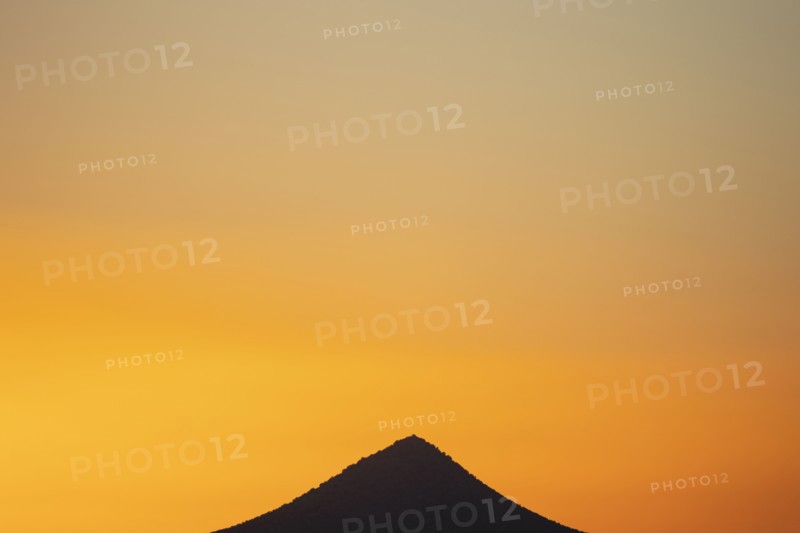 Sunset sky over peak in Cerrillos Hills State Park