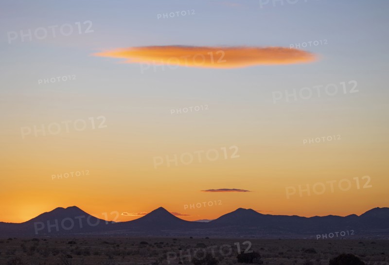 Lenticular cloud over Cerrillos Hills State Park at sunset