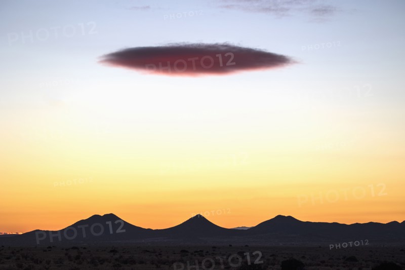 Lenticular cloud over Cerrillos Hills State Park at sunset
