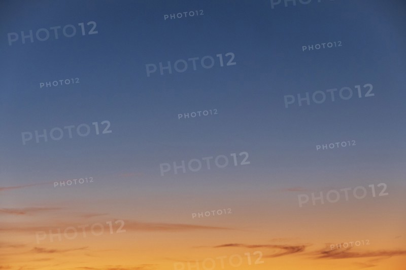 Blue and yellow sunset sky