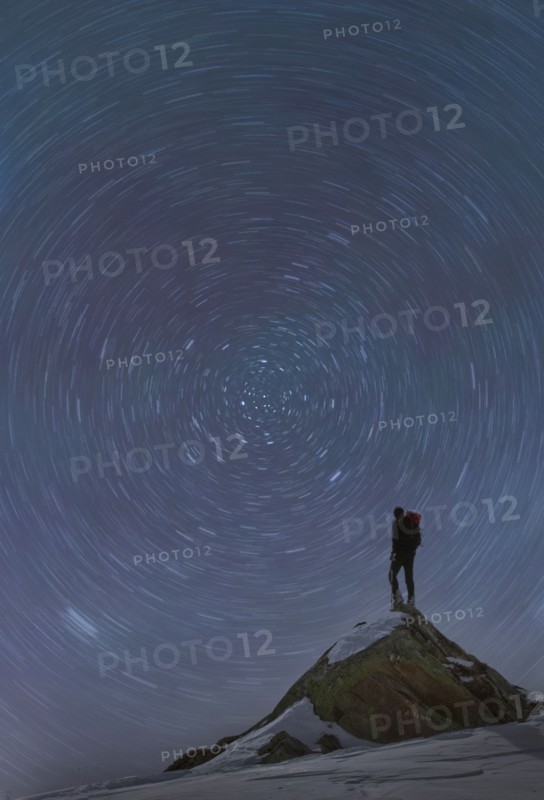 Climber standing on top of Mont Blanc