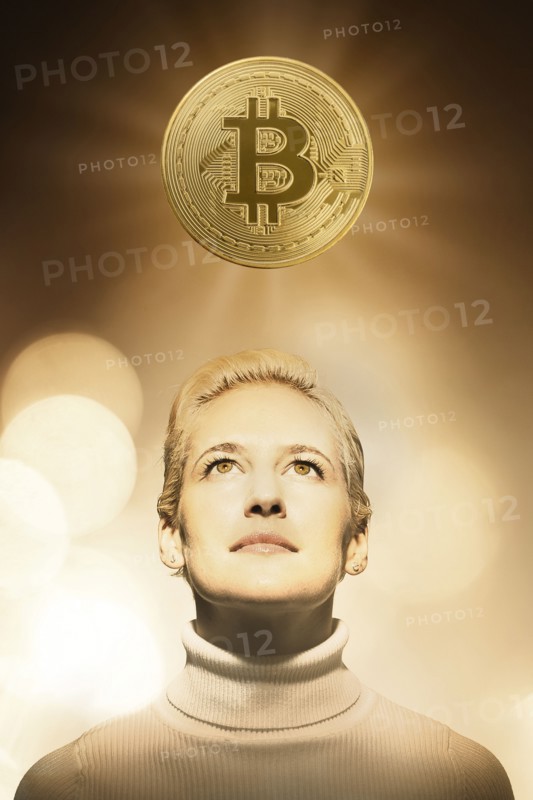 Woman with bitcoin over head