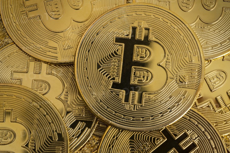 Close-up of golden bitcoins