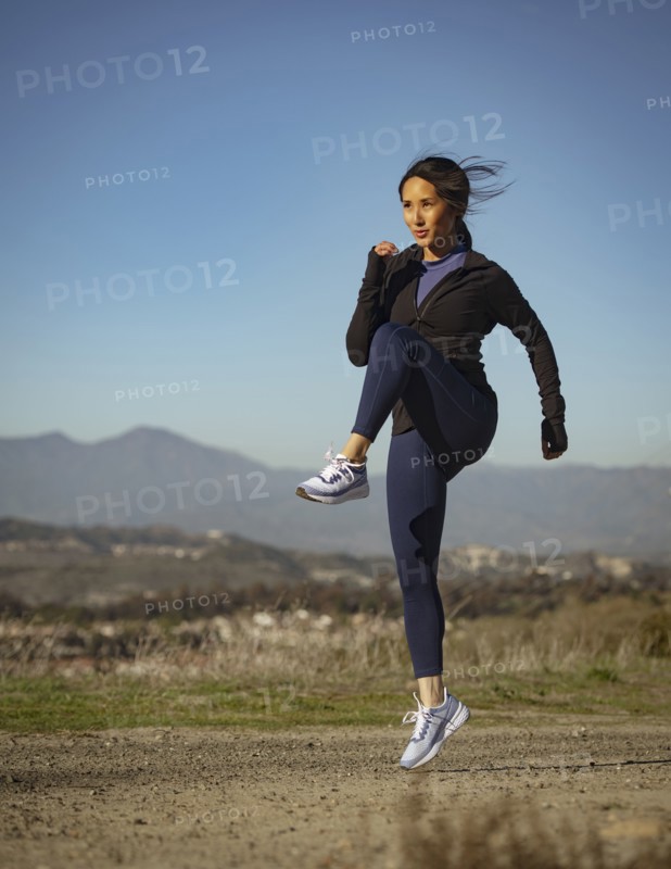 Woman exercising in landscape