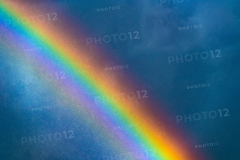 Rainbow against stormy sky
