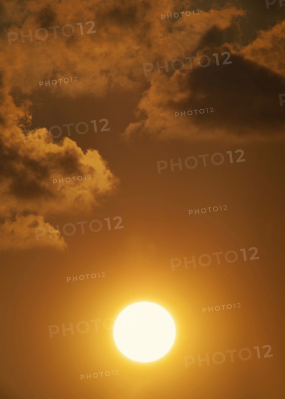 Setting sun and clouds