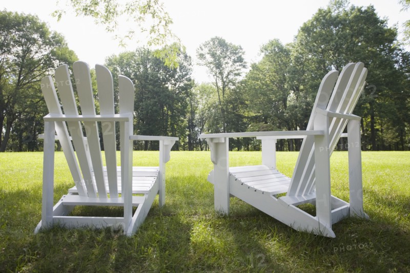 Adirondack chairs in backyard