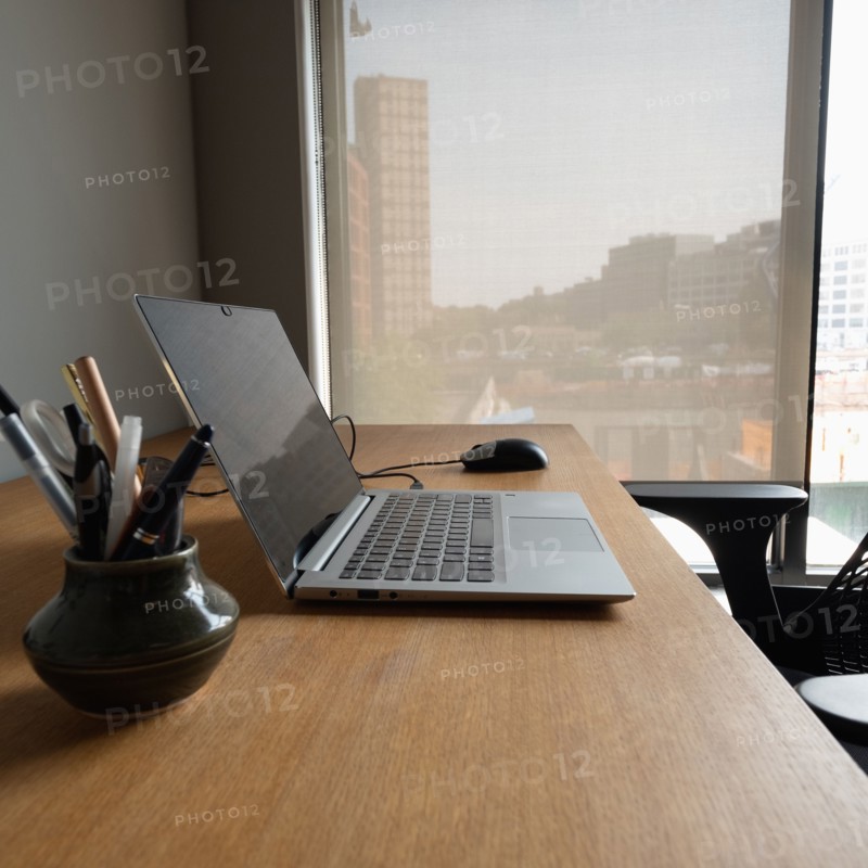 Open laptop on business desk