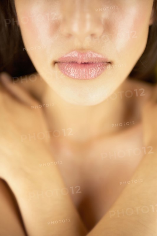 Close-up of shirtless woman