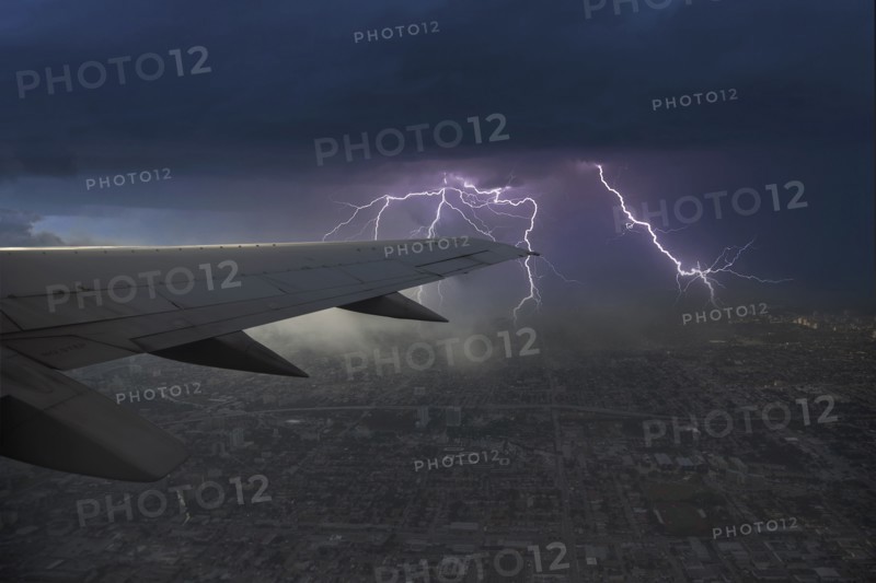 Thunderstorm and lightning seen from airplane