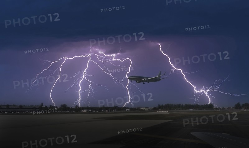 Commercial jet landing in thunderstorm