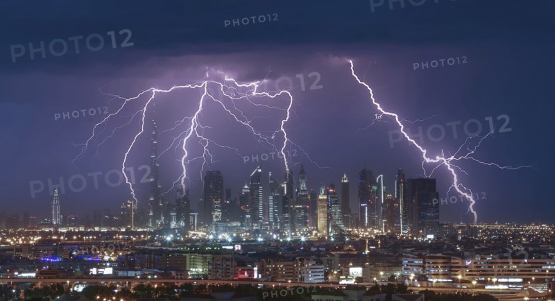 Thunderstorm over modern city