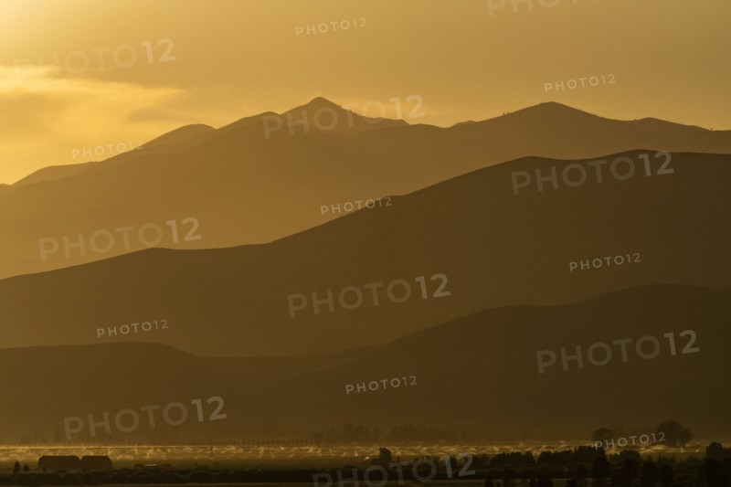 Silhouettes of mountains at sunset