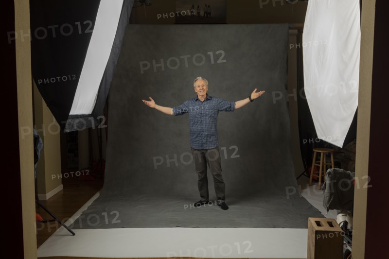 Photographer on photo studio set