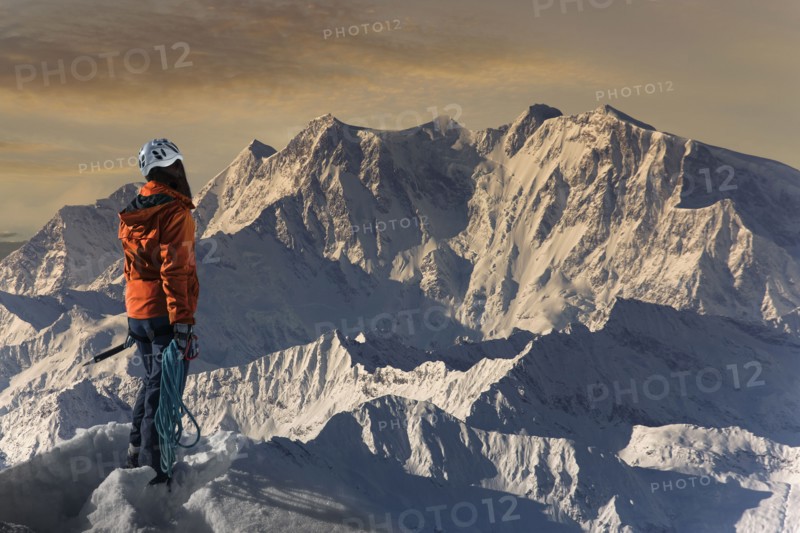 Caucasian hiker admiring scenic view from mountaintop