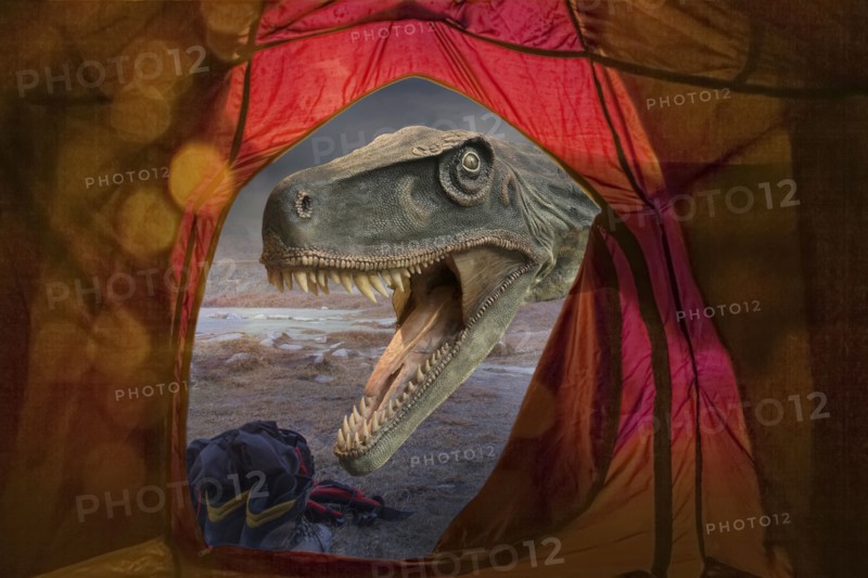 Dinosaur roaring outside tent at remote campsite