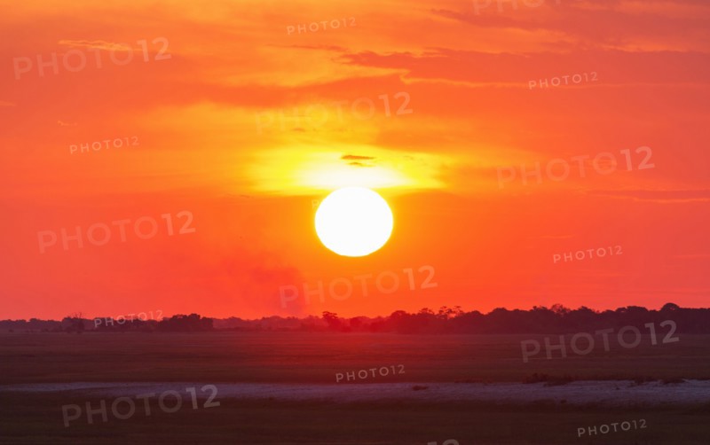 Glowing sunset over remote landscape