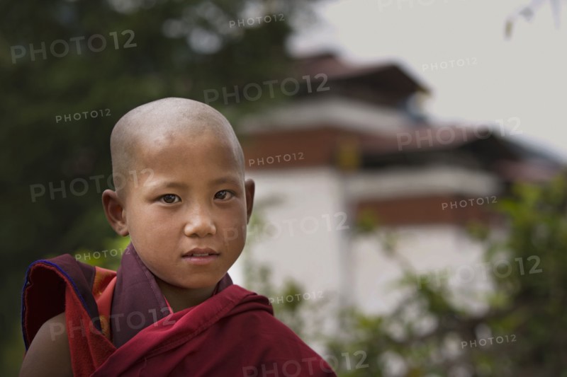 Asian boy wearing traditional robe