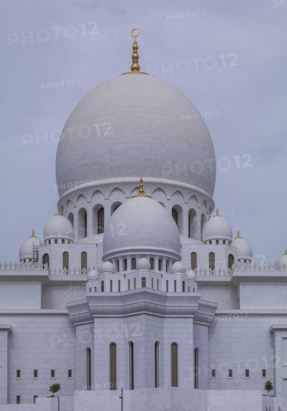 Ornate domed building under cloudy sky