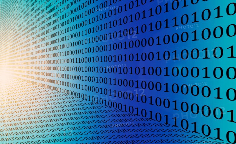 Close up of binary code moving towards light