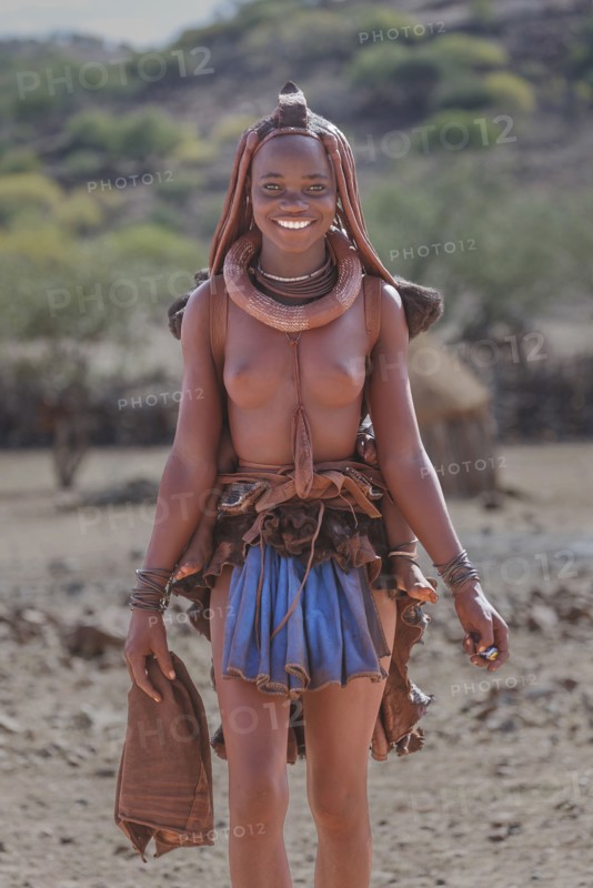 Black woman wearing traditional clothing and jewelry