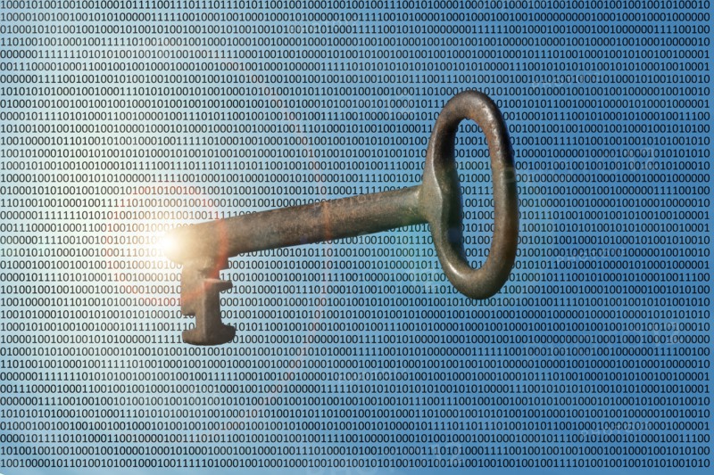 Skeleton key floating in binary code