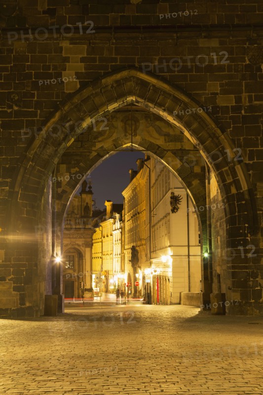 Arches in stone wall outside city