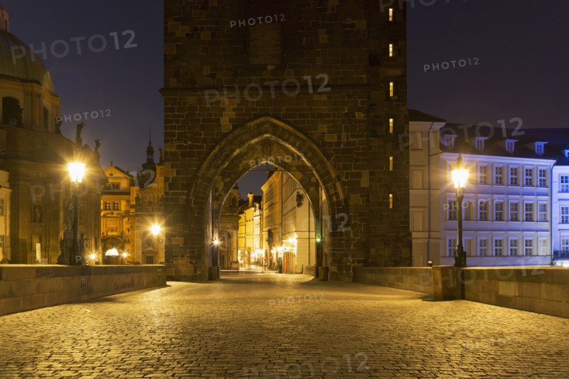 Arches in stone wall outside city