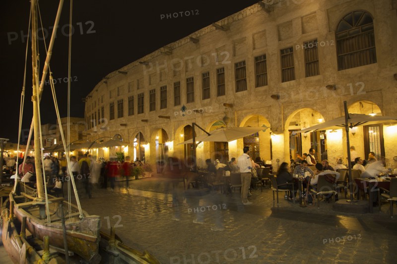 Blurred view of people shopping in outdoor market