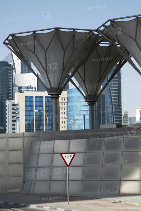 Roadsign under unique structures in Doha cityscape