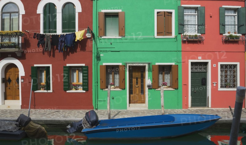 Gondolas parked in Venice Burano canal