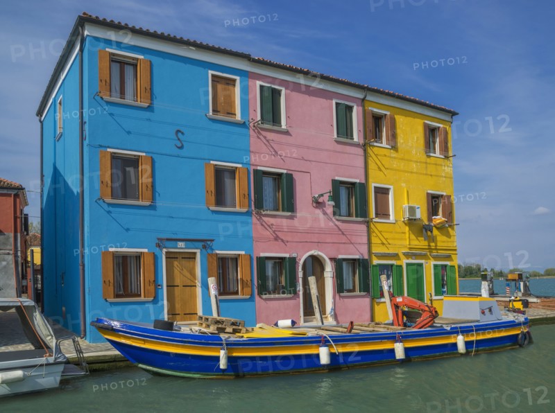 Gondolas parked in Venice Burano canal
