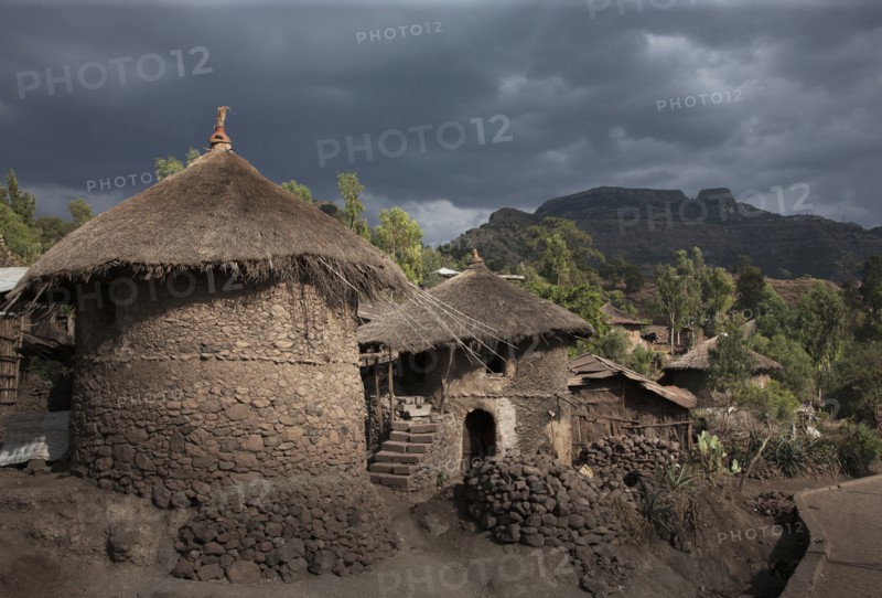 Village huts on remote hillside