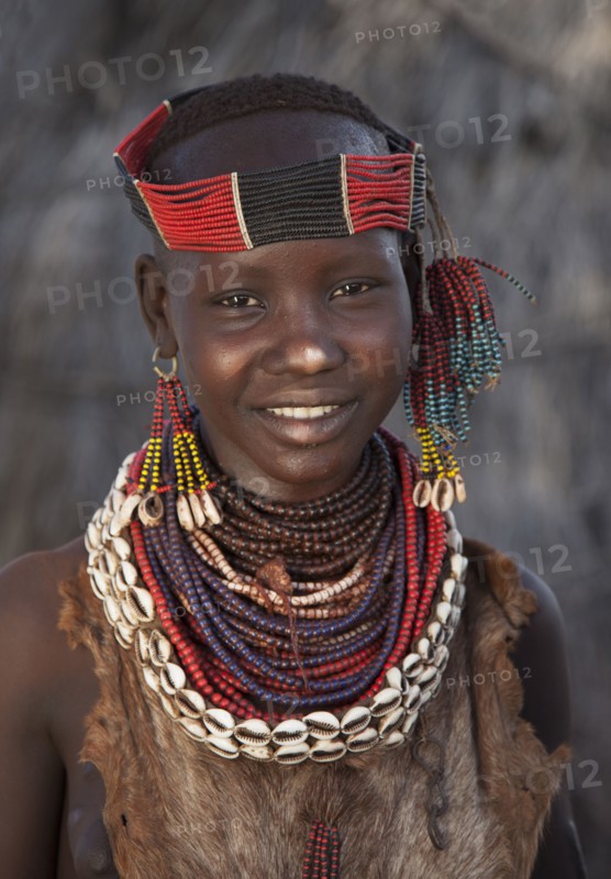 Black girl wearing traditional jewelry